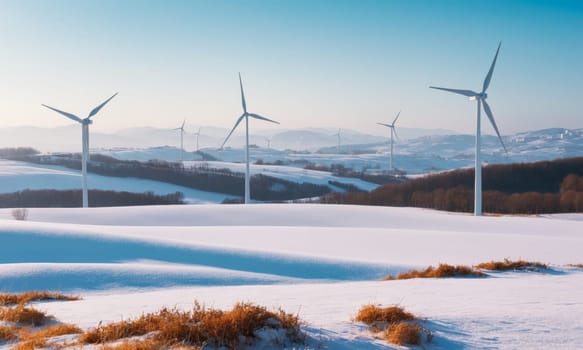 Wind turbines in snowy landscape. Alternative energy source