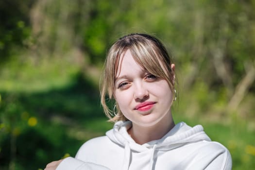 Portrait of a Russian schoolgirl on a sunny day