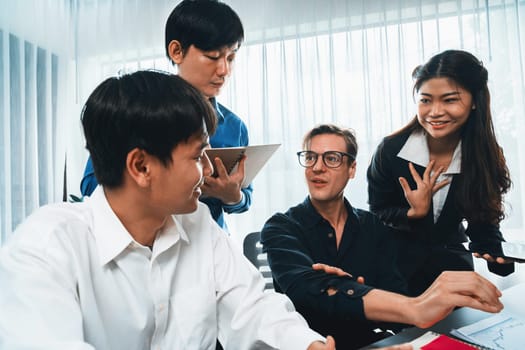 Group of diverse office worker employee working together on strategic business marketing planning in corporate office room. Positive teamwork in business workplace concept. Prudent