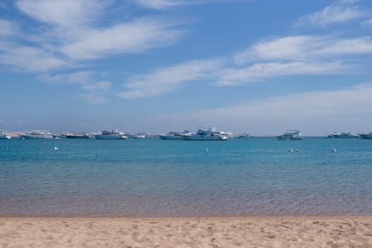 Beach Relaxation at the Red Sea. Fairy-tale Moments of a Sunny Day. The concept of tourism and sea travel.