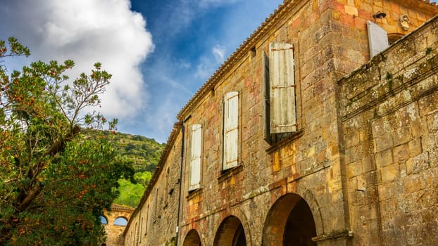 Fontfroide Abbey or Abbaye de Fontfroide is monastery in France gothic walls and arches