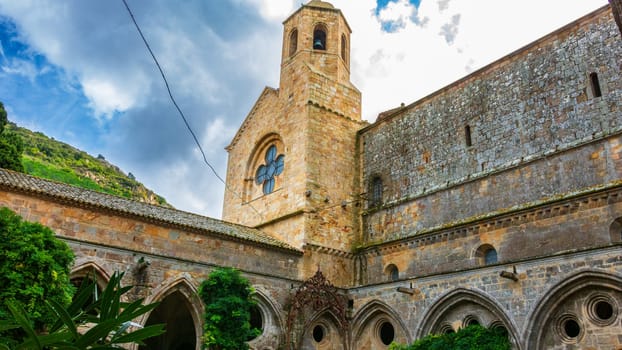 Fontfroide Abbey or Abbaye de Fontfroide is monastery in France gothic walls and arches