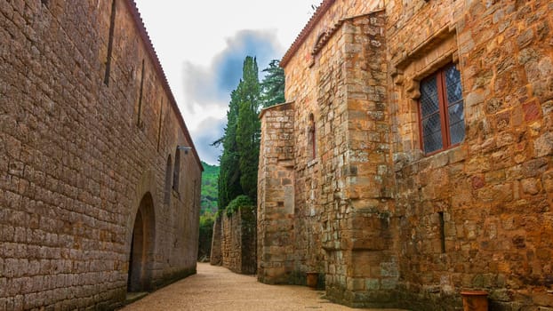 Fontfroide Abbey or Abbaye de Fontfroide is monastery in France gothic walls and arches