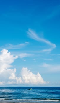 Seascape nature beauty, magic huge cumulus white clouds over blue sea, freedom happiness opportunity.