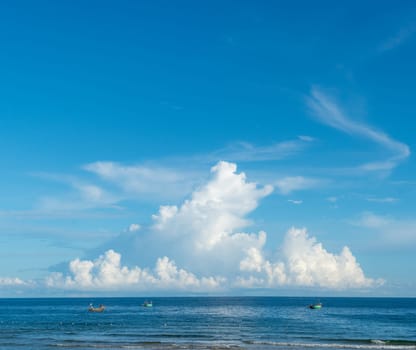 Seascape nature beauty, magic huge cumulus white clouds over blue sea, freedom happiness opportunity.