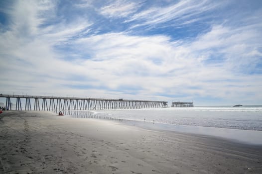 ROSARITO, MEXICO - 02-24-2024 The damaged pier at Rosarito Beach with a fallen section that was destroyed during a storm in late February.