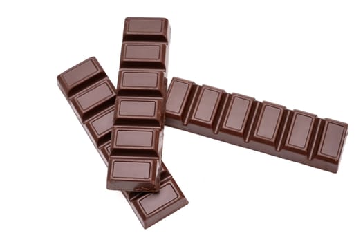 Three dark chocolate bars isolate on a white background.