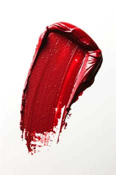 A smear of red lipstick on a white background. Decorative cosmetics. AI generated.