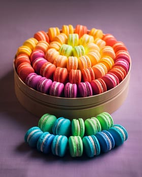 A colorful assortment of macarons neatly arranged in a box.