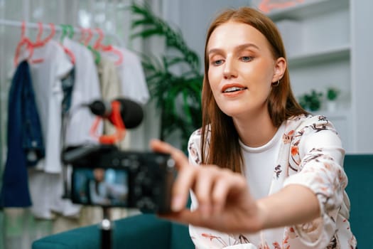 Woman influencer shoot live streaming vlog video review makeup utmost social media or blog. Happy young girl with cosmetics studio lighting for marketing recording session broadcasting online.