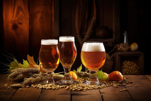 Three stemmed glasses with beer on a wooden table. .
