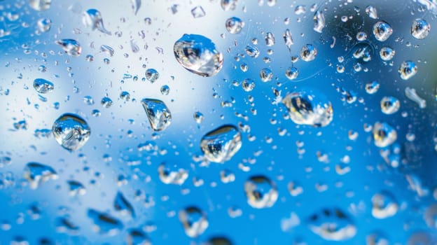 A close up of a window with water droplets on it