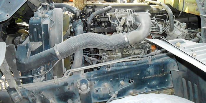 Diesel truck engine or truck engine with copy space for text. Metallic background of the internal diesel truck engine or car engine.