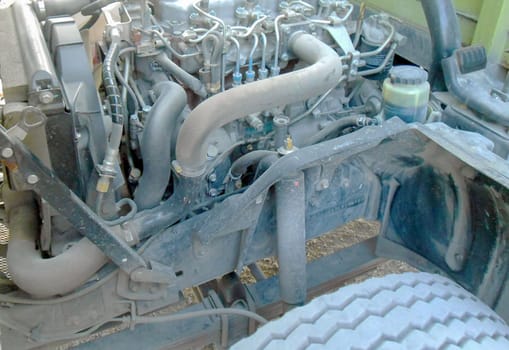 Diesel truck engine or truck engine with copy space for text. Metallic background of the internal diesel truck engine or car engine.