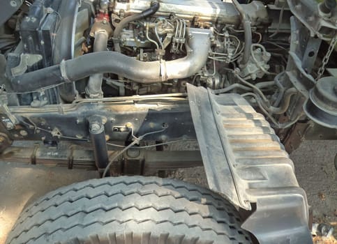 Diesel truck engine or truck engine with copy space for text. Metallic background of the internal diesel truck engine or car engine.