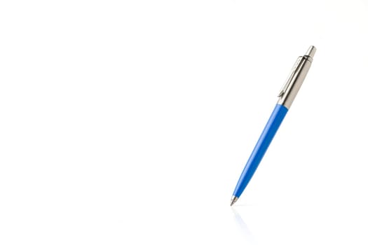 Blue plastic and metal ballpoint pen on white isolated background