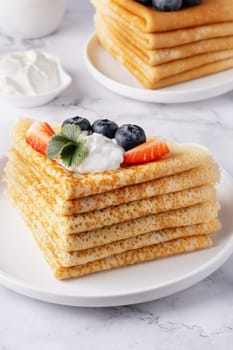 Pancakes with fresh berry fruit, Breakfast.