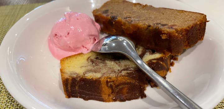 Fresh fruit cake and marble pound cake with strawberry ice cream on white plate for your multimedia backgrounds