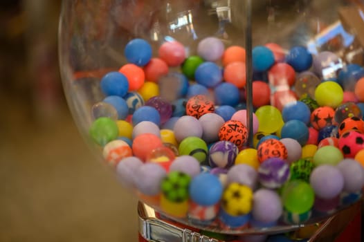 colored balls in a glass ball in a store