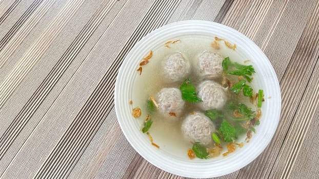 Delicious beef meatball soup tasty and healthy soup cooking also known as Bakso in Indonesia