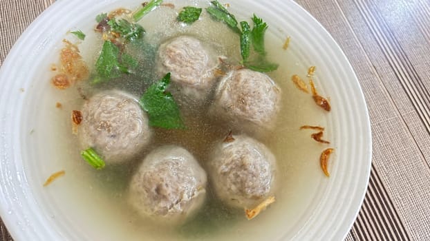 Delicious beef meatball soup tasty and healthy soup cooking also known as Bakso in Indonesia