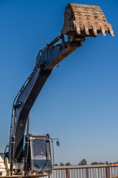 Close up details of industrial excavator working on construction site 5