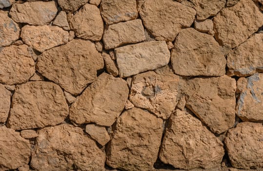 wall of clay bricks as background