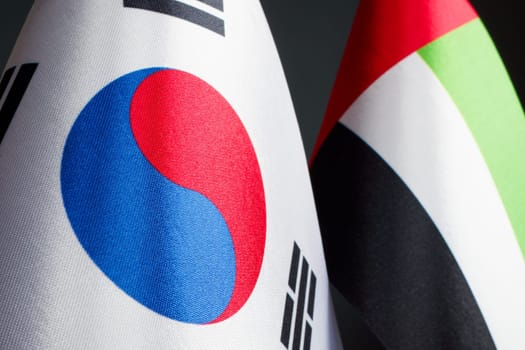 Close up of the flags of South Korea and the UAE.