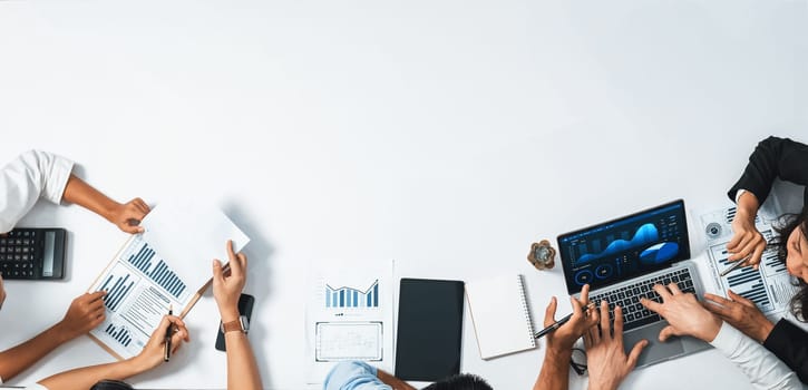 Group of office worker and businesspeople working on business financial data analysis. Empty space with editable blank background meeting table for customer design. Prudent