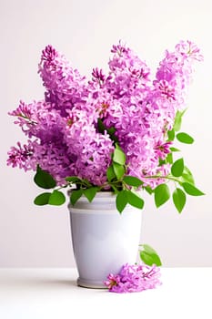 A bouquet of beautiful fragrant lilacs in a vase. AI generated.