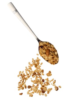 Oatmeal, raisins and almonds. Granola in metal spoon, top view