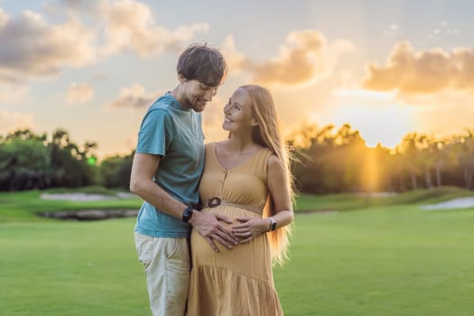 A blissful moment as a pregnant woman and her husband spend quality time together outdoors, savoring each other's company and enjoying the serenity of nature.