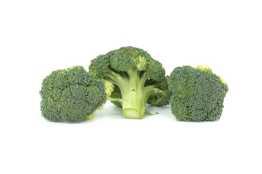 Fresh raw green broccoli florets isolated on white background