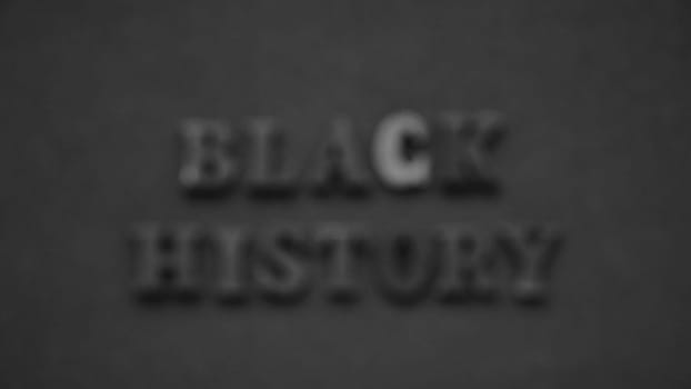 Inscription text Black History Month on dark grey isolated background close up. Celebrating the African American Conceptual Holiday for Equality