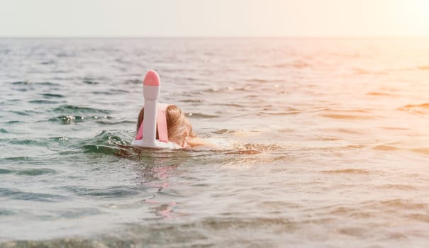 Young happy woman in white bikini put pink snorkeling mask on beach before swimming. girl having fun relaxing on beautiful beach. Beach lifestyle