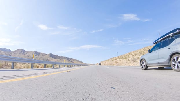 HWY 15, California, USA-December 3, 2022-Embarking on a road trip from Nevada to California, driving on Highway 15 during the day offers scenic views and an exciting journey between states.