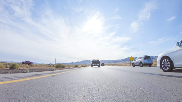 HWY 15, California, USA-December 3, 2022-Embarking on a road trip from Nevada to California, driving on Highway 15 during the day offers scenic views and an exciting journey between states.