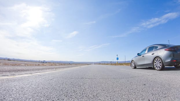 HWY 15, California, USA-December 3, 2022-Embarking on a road trip from Nevada to California, driving on Highway 15 during the day offers scenic views and an exciting journey between states.