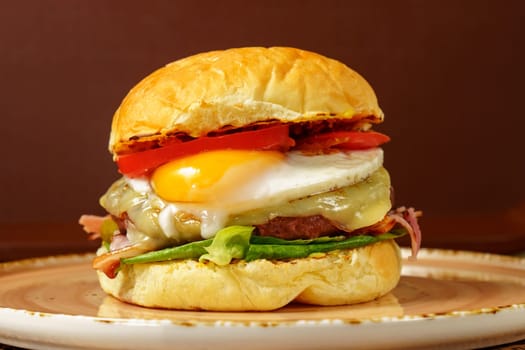 Gourmet Burger With Fried Egg and Bacon, ready to be enjoyed.
