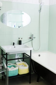 Budget bathroom interior in bright colors. Details of the bathroom interior