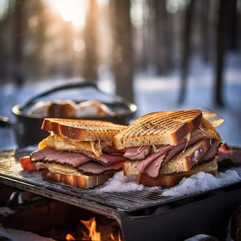 Grilled sandwiches cooked outdoors on a winter day