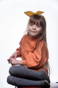 studio portrait of a charming little girl on a white background 5