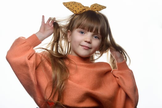 studio portrait of a charming little girl on a white background 6