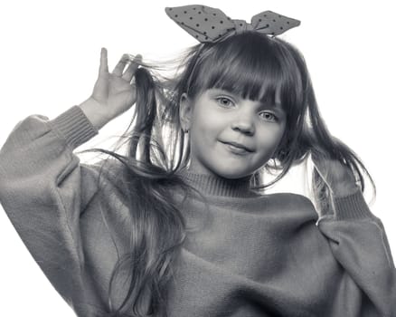 studio portrait of a charming little girl on a white background 9