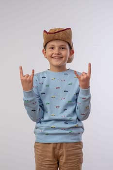 portrait of a boy in a cowboy hat on a white background 3