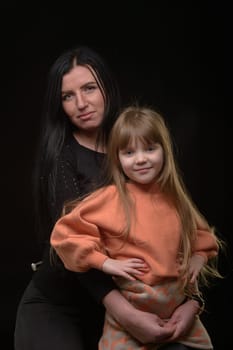mother and daughter studio portrait happy family 4