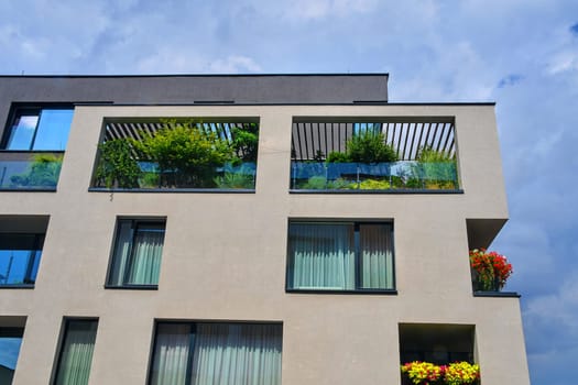 Uherske Hradiste, Czech Republic - July 13, 2018: Modern architecture. Urban terrace with flowers and greenery. Urban house.