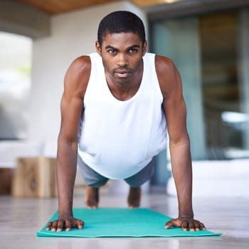 Fitness, yoga and portrait of black man in home for wellness, flexibility and balance for healthy body. Training, pilates and person on sports mat for stretching, workout and exercise in living room.