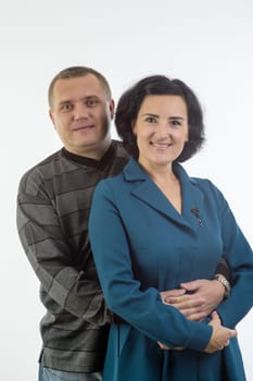 studio portrait of husband and wife happy family 2