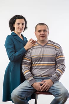 studio portrait of husband and wife happy family 1